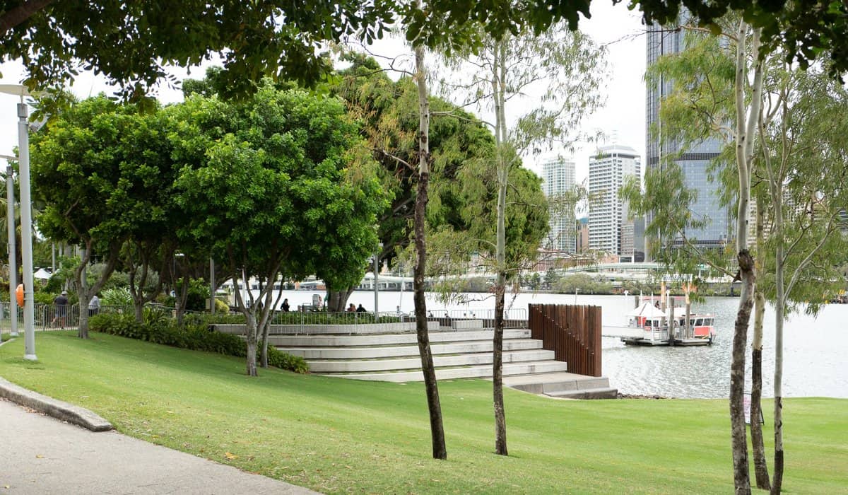 Riverside parkland at South Bank Brisbane with city skyline in the background